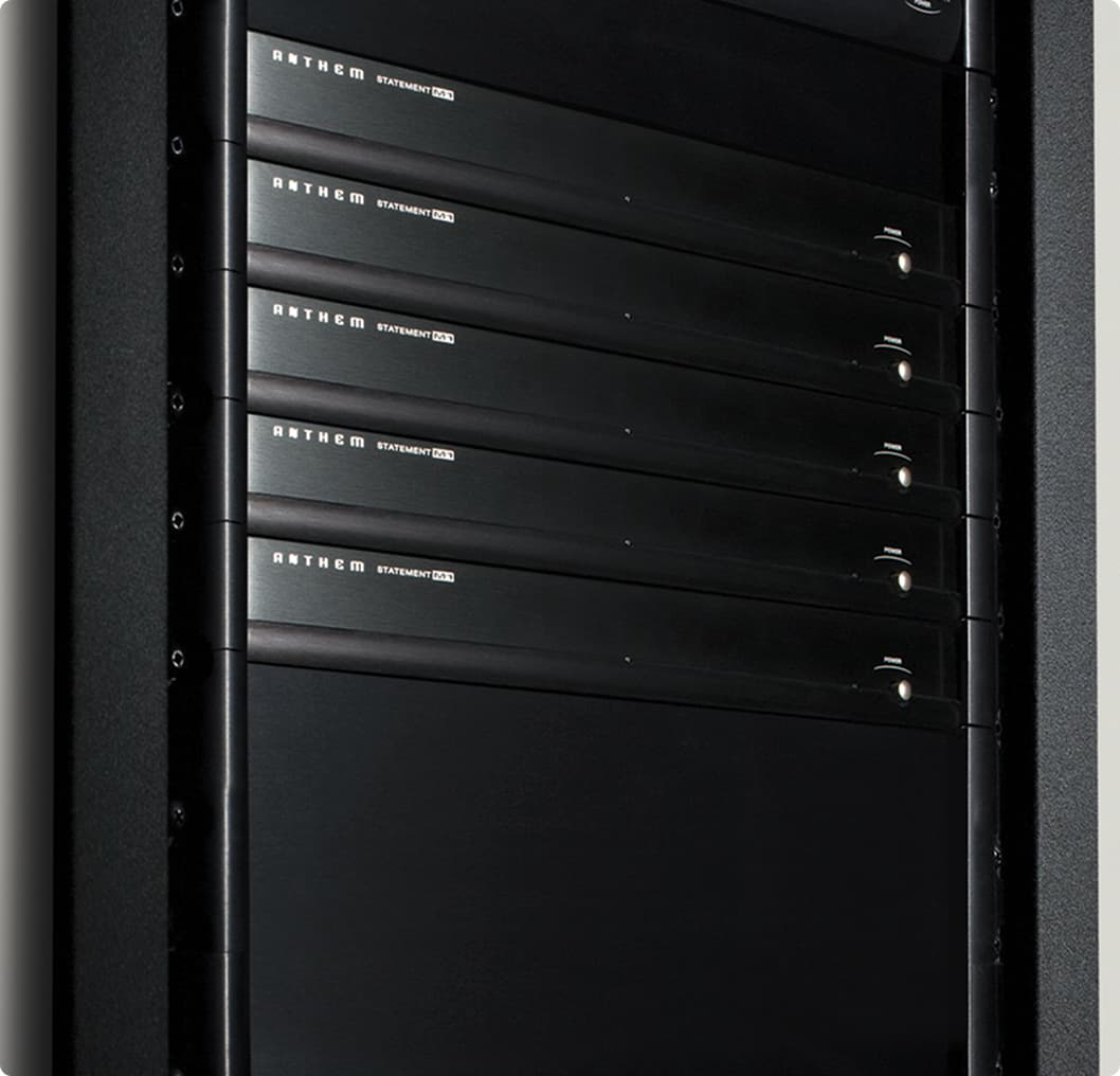 MDX-16 amplifier displayed with Paradigm Founder Series speakers in home theater environment