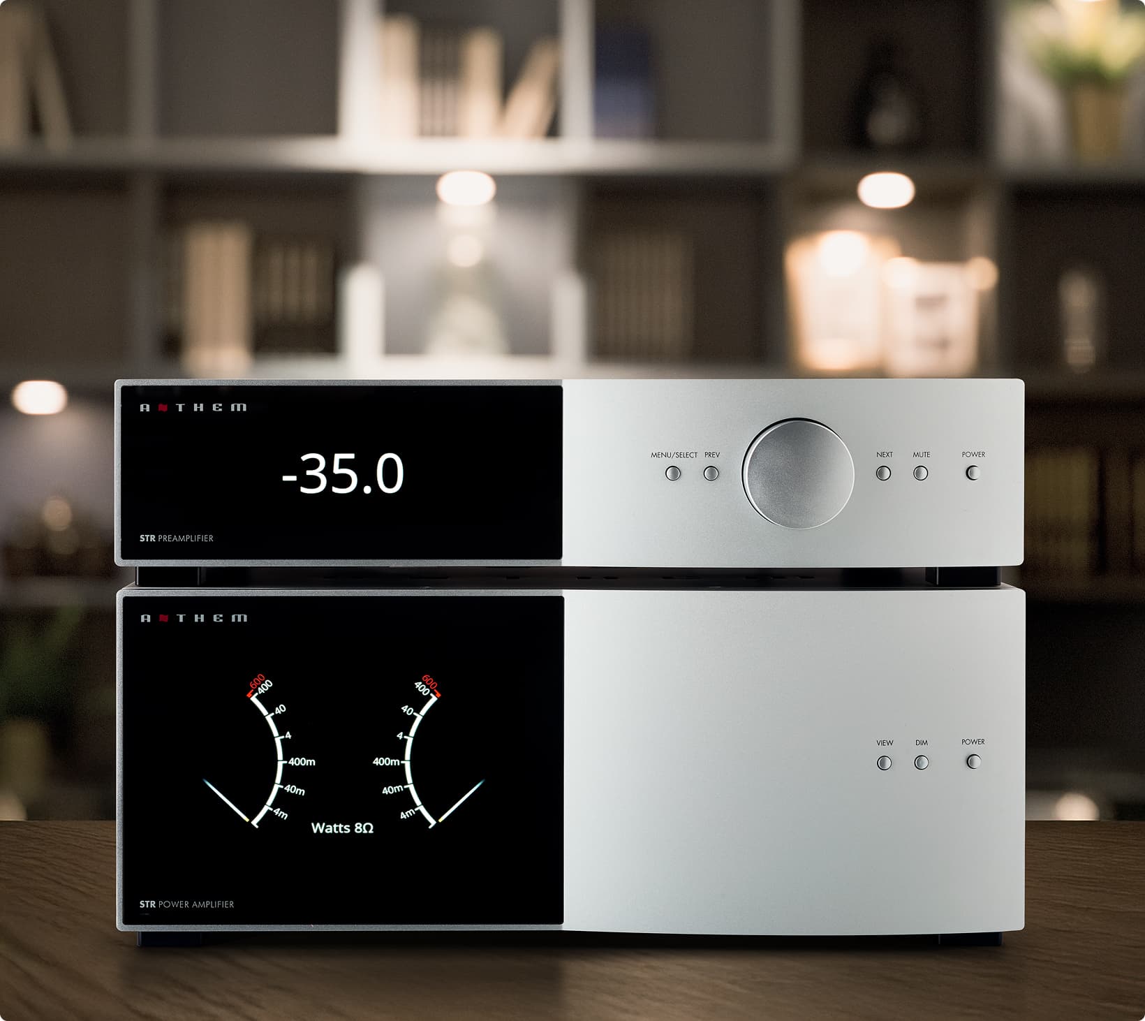 Silver STR preamp and amp stacked together in home theater environment