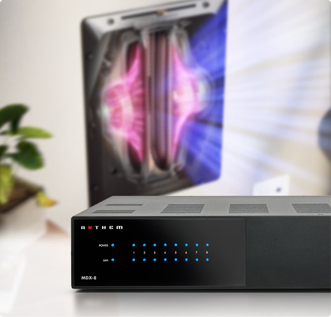 Living room setup showing MDX-16 front panel and SFC-12SW in-wall subwoofer